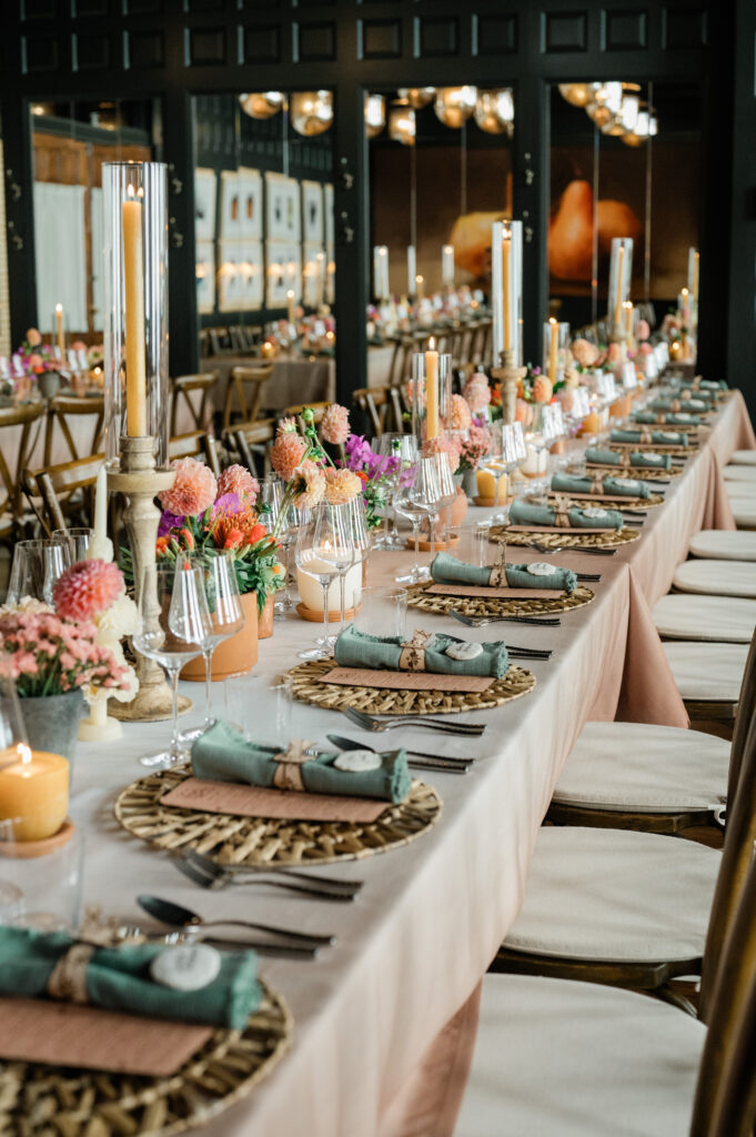 Stunning table setting with Aspen wildflowers, chargers with natural fibers and soft candleight.